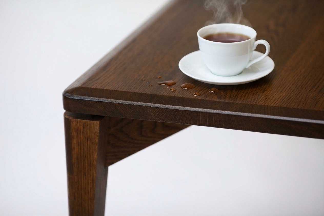 Oak table with a cup of tea