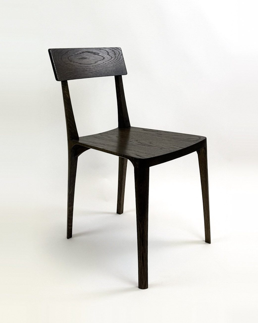 The Pilar chair in dark-finished oak